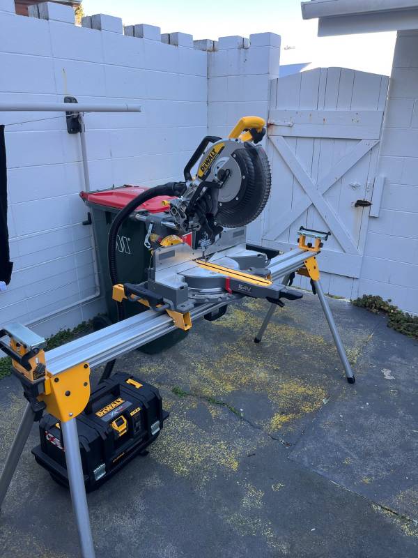 12” Dewalt drop saw, stand and extractor